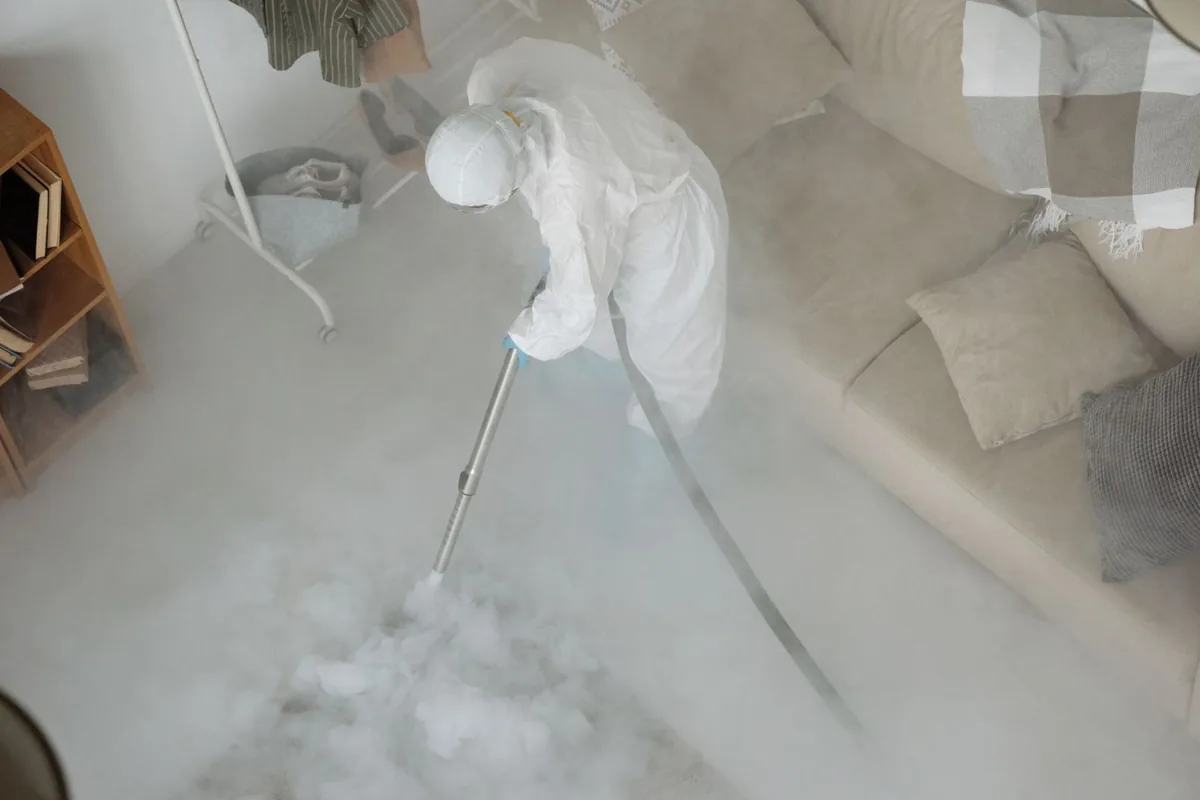 Biohazard cleanup technician in protective equipment, Natchitoches, LA